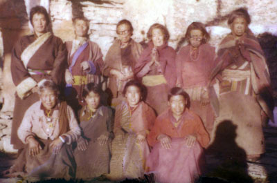 Polaroid picture of the Muktinath nuns in 1980 together with Lama Wangyal.